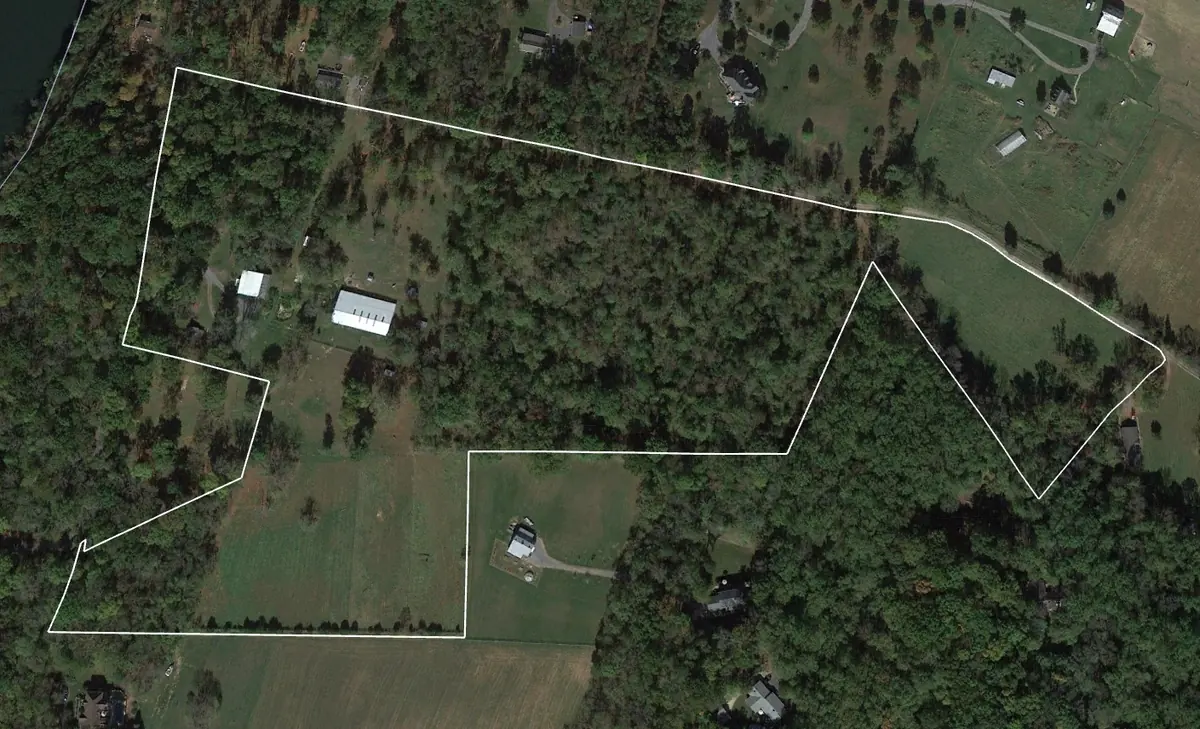 Aerial orthophoto of the parcel, the measured base every later layer sits on.